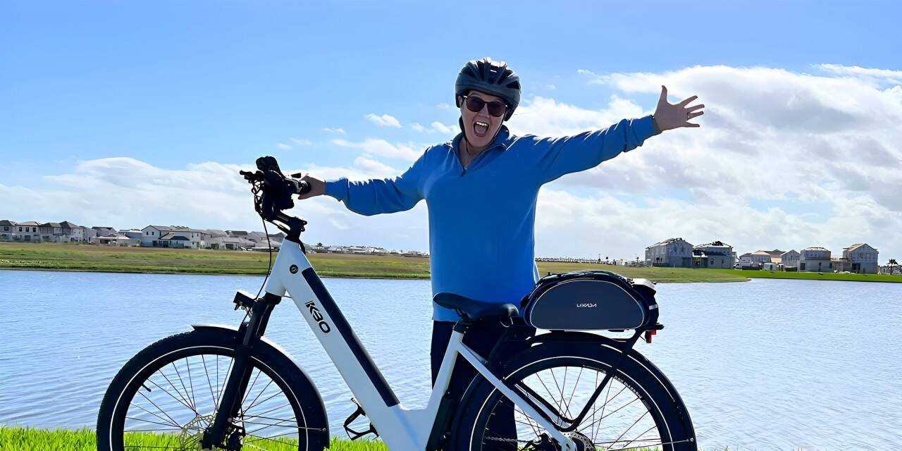 WEBIKEU enjoy banner - woman enjoying biking