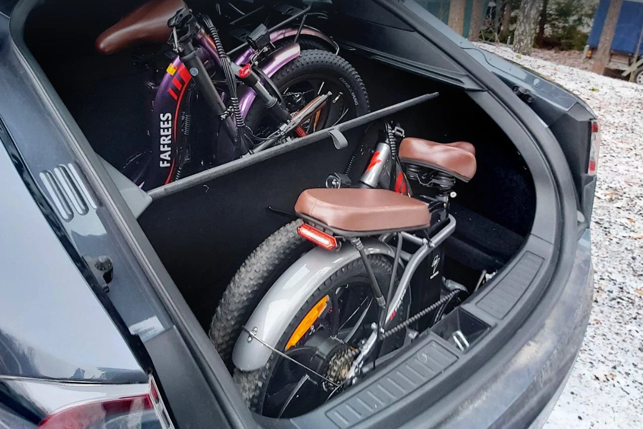 Two Fafrees electric bikes from WEBIKEU in the boot