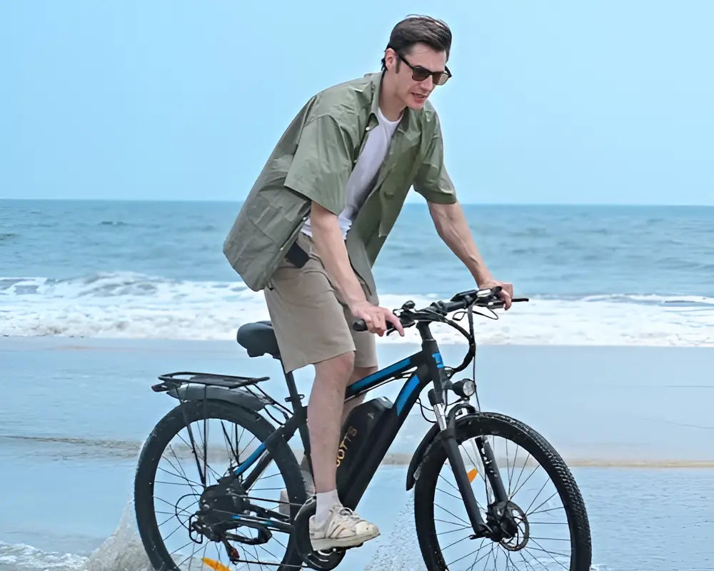 man riding DUOTTS C29 PRO Electric Bike on the beach