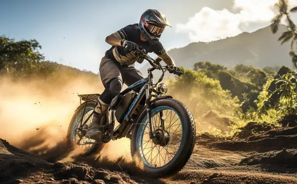 Man riding PHILODO electric bike in sandy wilderness